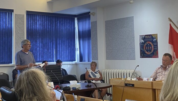 Glenn-council-sm Resident Glenn Pettigrew presents his petition against expanded OHV access to Oxford Town Council
